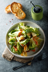 Traditional homemade Caesar salad with salmon
