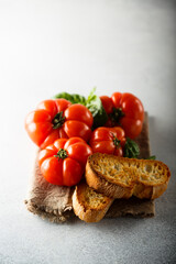 Ripe tomatoes with toasted bread