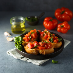Traditional homemade bruschetta with tomato and basil