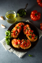 Traditional homemade bruschetta with tomato and basil