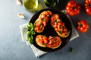 Traditional homemade bruschetta with tomato and basil