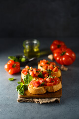 Traditional homemade bruschetta with tomato and basil