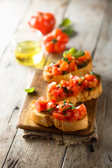 Traditional homemade bruschetta with tomato and basil