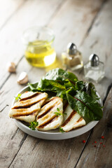 Grilled halloumi cheese with fresh green salad