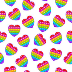 Seamless pattern, heart toy. Colorful sensory anti-stress toy for fidget pop it. Colorful silicone bubbles. A fashionable toy with a simple dimple of rainbow color on a white background.