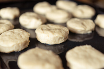 Process of raising the dough in a special basket. Dough made from natural sourdough. Wheat dough. Fermentation. Top view.	