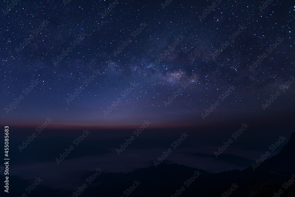 Wall mural milky way galaxy at night. image contains noise and grain due to high iso. image also contains soft 