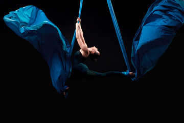 A female gymnast on an gymnastic canvases