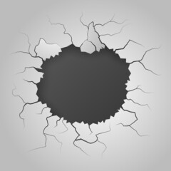 cracked hole in the white wall
