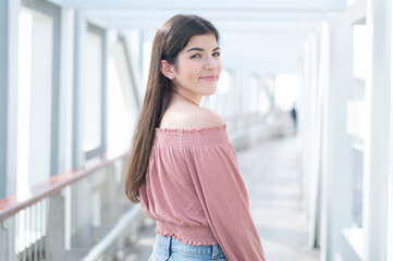 Portrait of young beautiful woman in summer time.