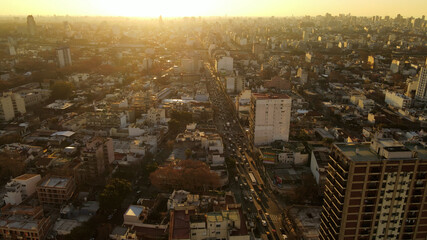 Beautiful aerial view of the City of Buenos Aires at sunset, with heavy traffic in one of its main streets