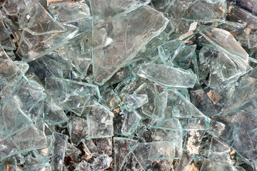 Broken glass. Pieces of broken glass. Sharp glass.