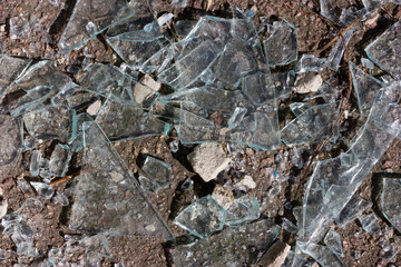 Broken glass. Pieces of broken glass. Sharp glass.