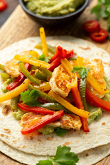 Tasty Halloumi cheese Fajitas with tortilla mix pepper and guacamole. Healthy food