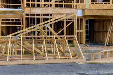 Wood building frame structure on a new development