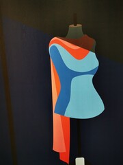 2D colourful mannequins in shapes of blue and red