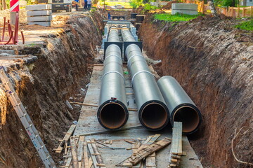 Russia, Samara, June 2021: repair work in the city to replace water pipes on a summer sunny day in...