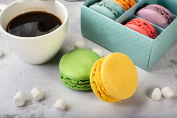 French macaroni. the most delicate cake is a cookie made of two smooth halves, fastened with stringy fillings.French pastry made from egg whites. French macaroni in different colors.