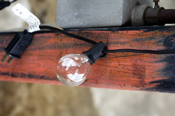 one tungsten bulb with steel beams