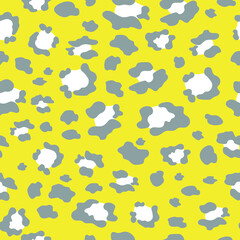 Leopard is in fashion. Seamless pattern with spots of wild animals for modern fabrics, textiles, decorative pillows, bed linen. Yellow and gray colors 2021. Vector.