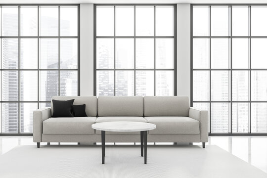 Couch in a panoramic white living room