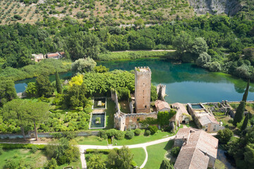 frontal aerial view of the gardens of ninfa in the country of cisterna di latina - obrazy, fototapety, plakaty