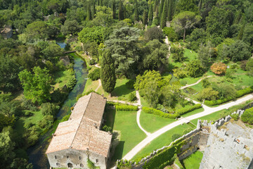 aerial close-up view of the gardens of ninfa in the country of cisterna di latina - obrazy, fototapety, plakaty