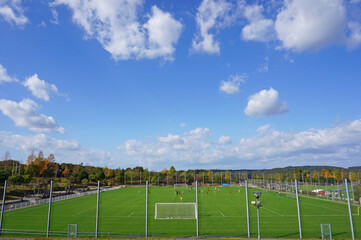 Fototapeta premium Women's soccer on a sunny autumn ground, Miki City, Hyogo Prefecture, Japan