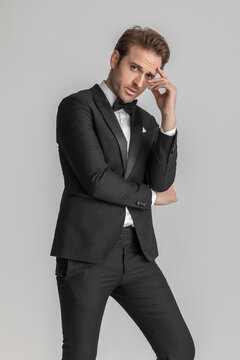 businessman folding his arms and posing with attiude