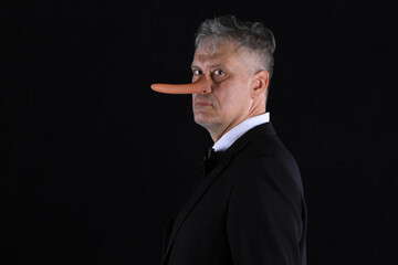 male businessman with long nose