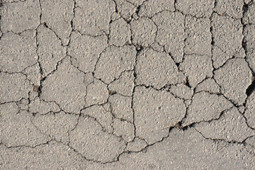 image of cracked asphalt close-up.