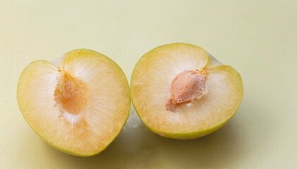 Cutted of Lemon Plum with yellow pulp,