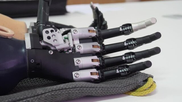 future technology in black prosthetic robotic hand concept of futuristi