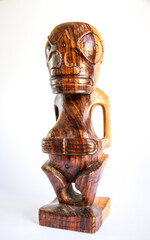traditional wooden Polynesian tiki from Marquesas Islands. White background