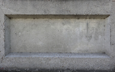 concrete wall background with a rectangular cavity and framed
