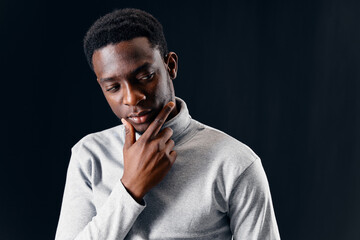 man in gray sweater gesturing with hands fashion isolated background