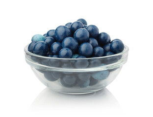Blueberries candies isolated on white.