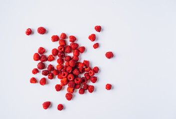 freshly red raspberries isolated on white background