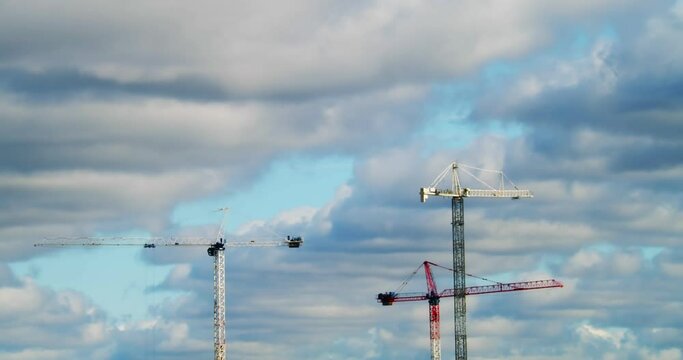 Timelapse view of crane construction site.