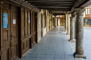 Old street with arcades in Cervera de Pisuerga, Palencia, Spain
