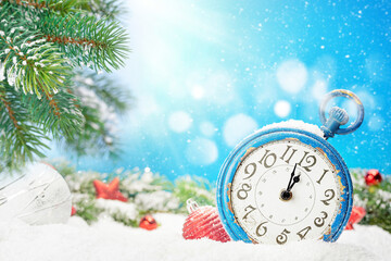 Fototapeta na wymiar Christmas greeting card with alarm clock and decor