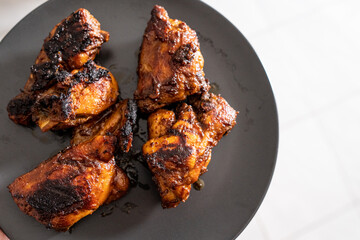Indonesian Traditional Chicken Grilled on Top of Skillet