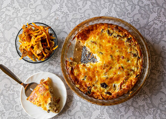 Salty pie or quiche made with Craterellus lutescens or Cantharellus lutescens or Cantharellus xanthopus or Cantharellus aurora, commonly known as Yellow Foot, is a species of mushroom.