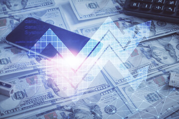 Double exposure of grow arrows drawing over usa dollars bill background. Concept of success.