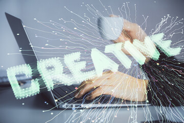 Double exposure of woman hands typing on computer and creative drawing. Start up concept.