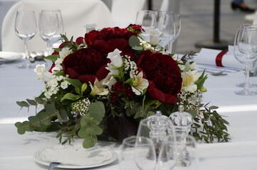 a beautiful wedding flower arrangement on the table