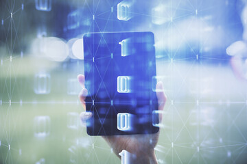 Double exposure of technology sketch hologram and woman holding and using a mobile device. Ai...