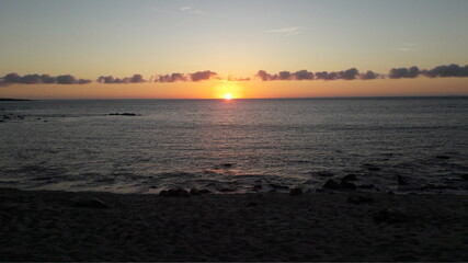 sunset over the sea in cancun mexico