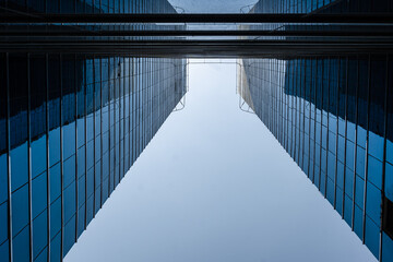 Geometric lines in urban architecture. A glass skyscraper.