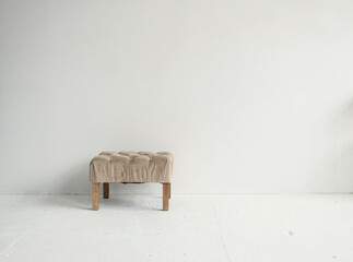 Stylish armchair near wall